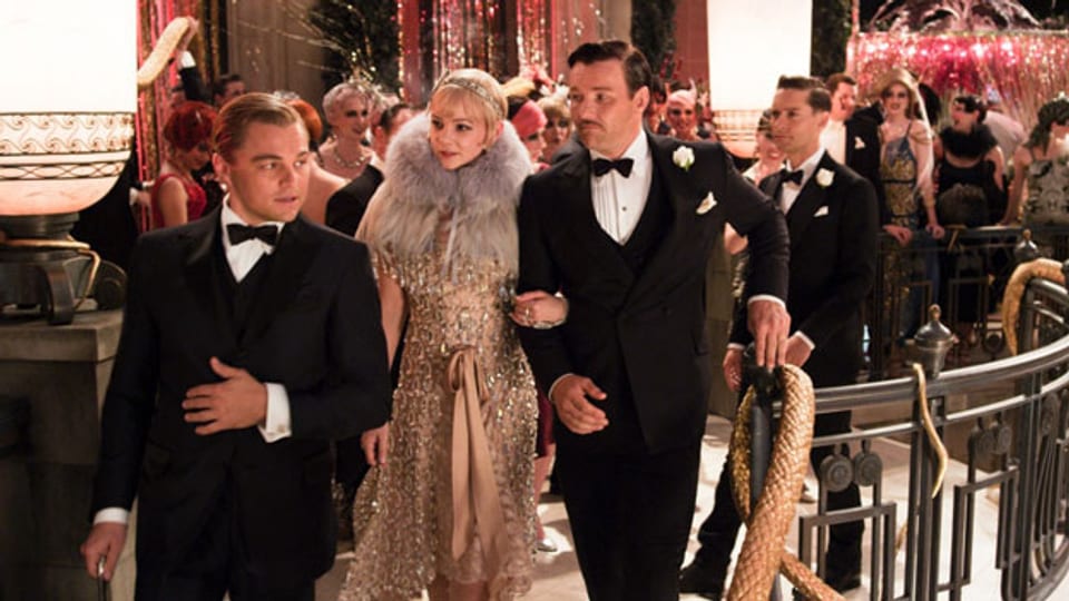 Jay Gatsby (Leonardo DiCaprio), seine Angebetete Daisy (Carey Mulligan), ihr Mann (Joel Edgerton) und ihr Cousin Nick (Tobey Maguire).
