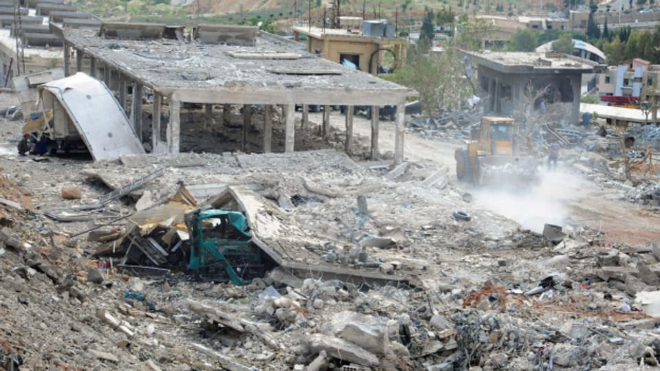 Nach dem Beschuss von Damaskus zeigen die Bilder der syrischen Nachrichtenagenturen ein Bild der Zerstörung.