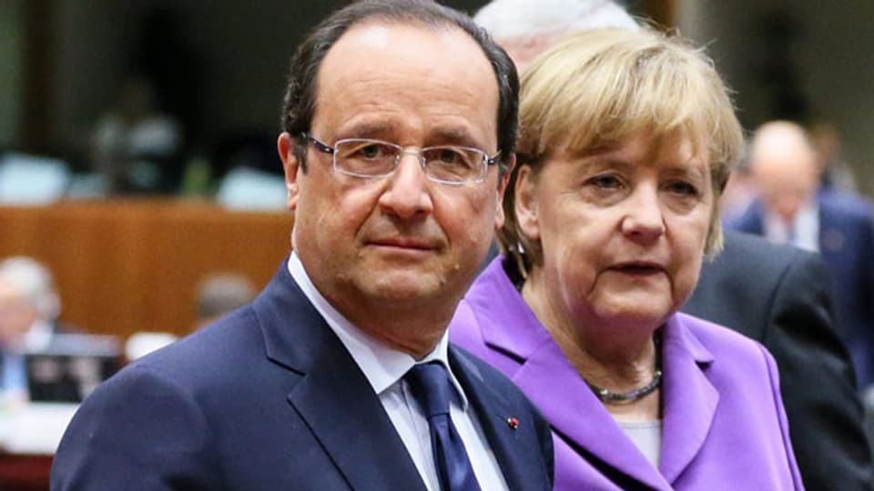 Der französische Präsident Francois Hollande (links) die deutsche Bundeskanzlerin Angela Merkel am EU-Gipfel in Brüssel, Belgien, am 25. Oktober 2013.