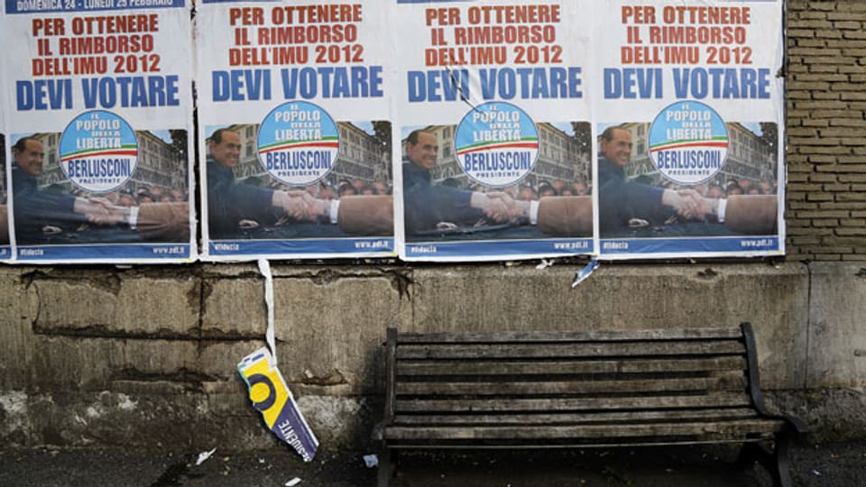 Wahlkampfposter von Silvio Berlusconi, gesehen in Rom am 21. Februar 2013.