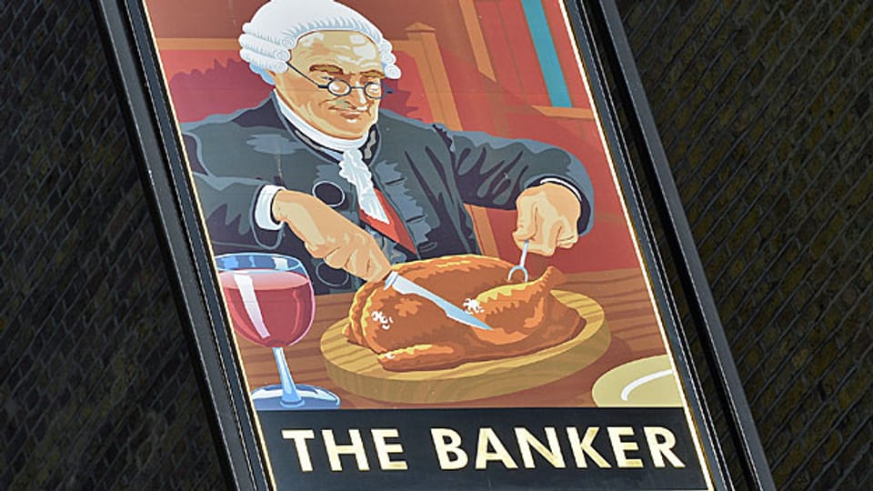 Ein Pub-Schild im Londoner Finanzdistrikt. Nach dem Willen der EU müssen sich Banker müssen künftig mit kleineren Boni zufrieden geben.