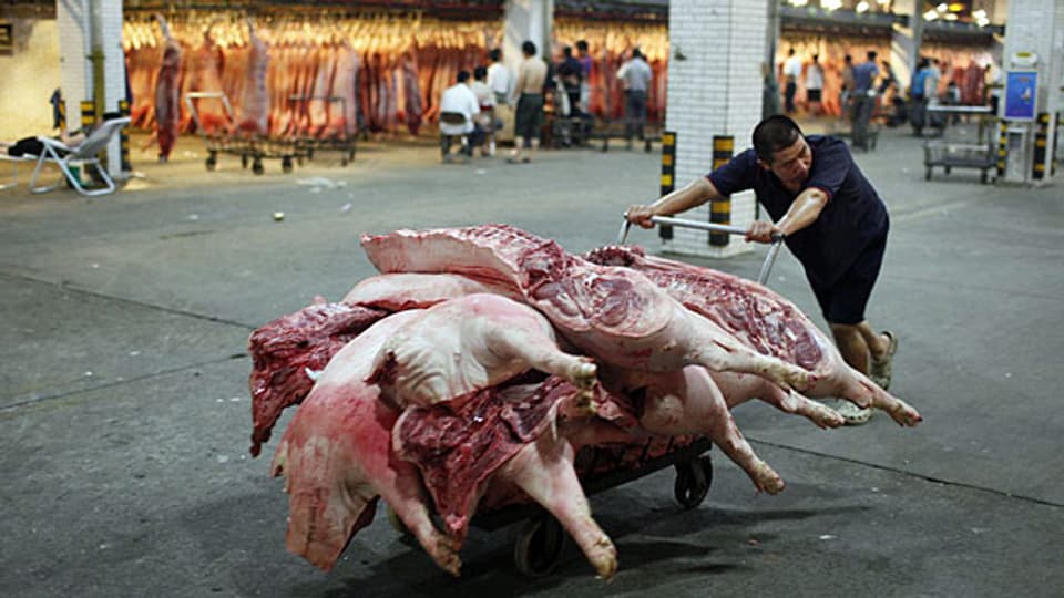 In China wird immer mehr Schweinefleisch gegessen.