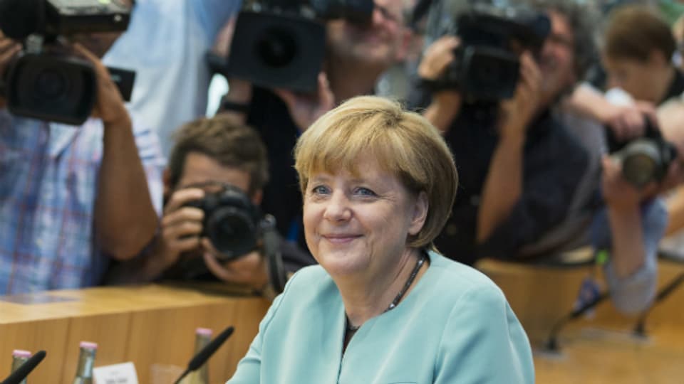 Merkel bei ihrem letztem Presseauftritt vor den Ferien.