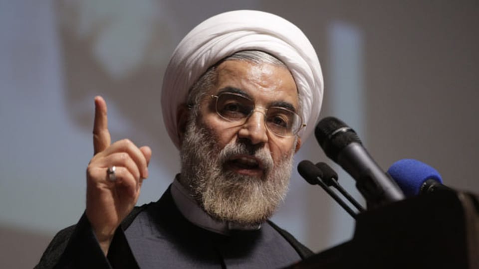 Hassan Rohani, der neue Präsident Irans. Die Mächtigen der Welt rechnen nicht mit einem Neuanfang. Iran muss zuerst seine internationalen Verpflichtungen erfüllen.