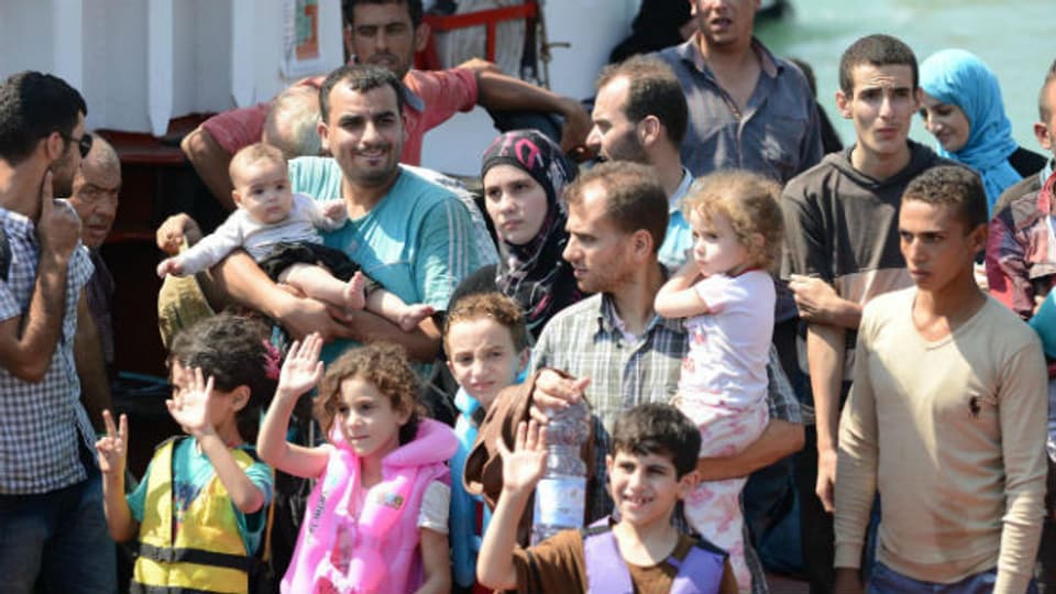Eine Flüchtlingsgruppe nach ihrer Ankunft in Catania am 19. August 2013