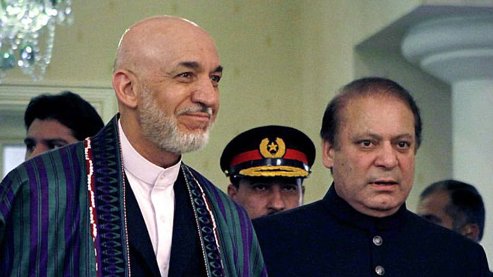 Der afghanische Präsident Hamid Karzai und der neue pakistanische Premier Nawaz Sharif, am 26. August in Islamabad.