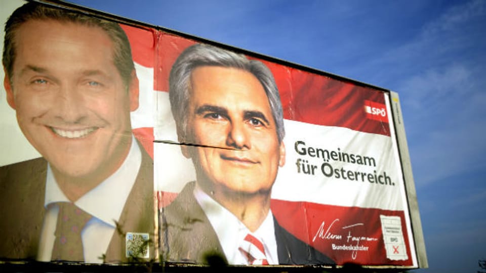 Die beiden Spitzenkandidaten Heinz-Christian Strache von der FPÖ und Werner Faymann von der SPÖ auf einer Plakatwand.