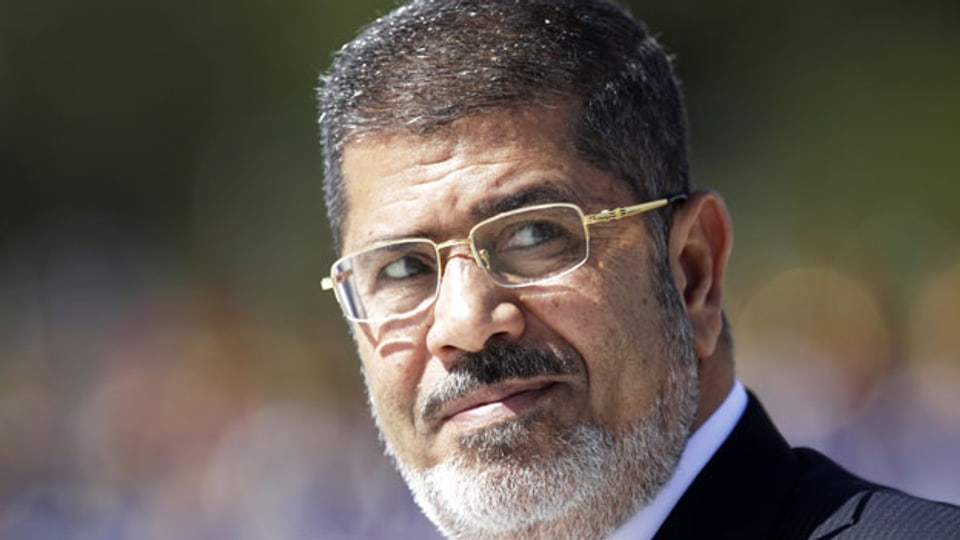 Mursi sagte am Prozess, er sei hier nicht der Angeklagte, sondern der legitim gewählte Präsident Ägyptens .Bild vom 8. Mai 2013.