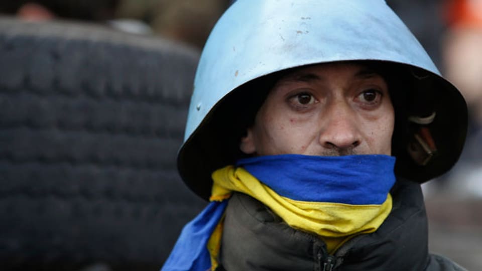 Ein Anti-Regierungs-Demonstrant auf dem Unabhängigkeitsplatz in Kiew am 21. Februar 2014.