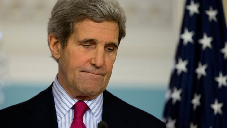 Der US-Aussenminister John Kerry droht mit Wirtschaftssanktionen.
