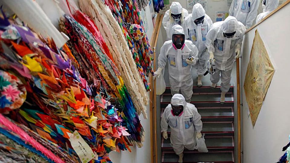 Ausländische Presseleute auf einer Führung durch das AKW Fukushima, am 10. März 2014.