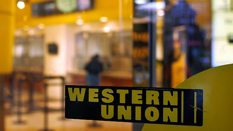 Western Union verdient viel Geld mit Finanztransfers nach Afrika.