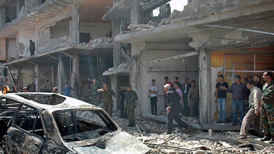 Eine Strasse in Homs - nach der Explosion einer Autobombe am 29. April 2014.
