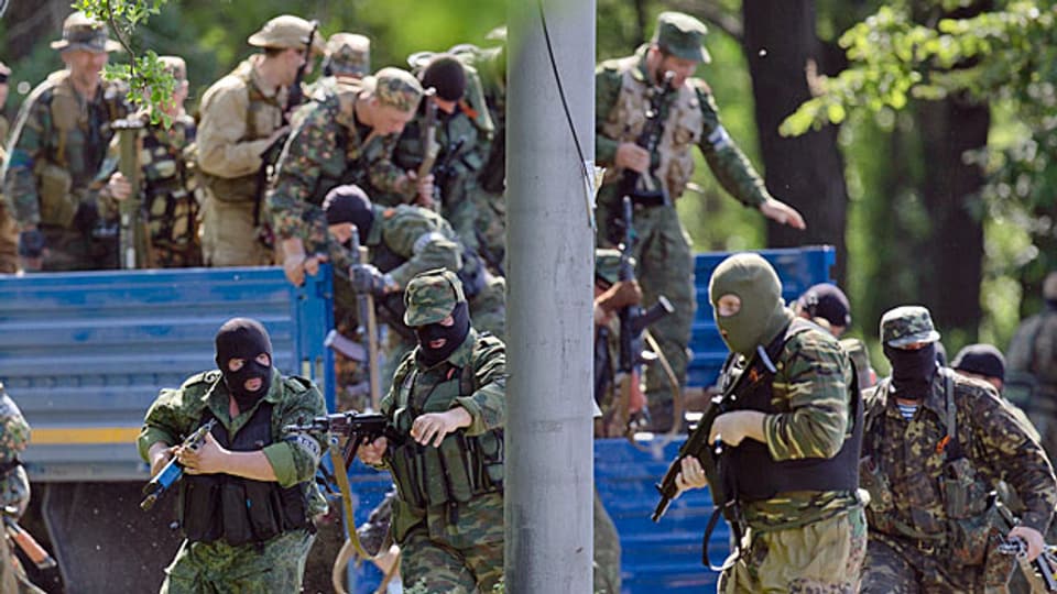 Bei Kämpfen in Donezk wurden nach der Darstellung der prorussischen Rebellen mehr als 50 ihrer Kämpfer getötet.