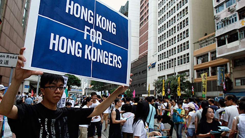 Ein Demonstrant an einer von zahlreichen Kundgebungen in Hongkong. Die Forderung: mehr Demokratie für Hongkongs Bevölkerung.