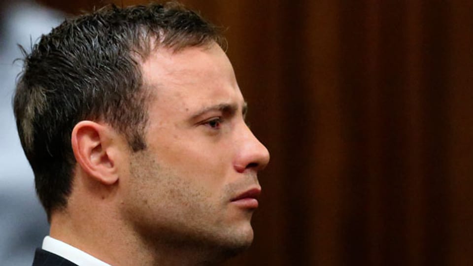 Oscar Pistorius hört das Urteil in seinem Prozess am Oberlandesgericht in Pretoria am 12. September 2014.