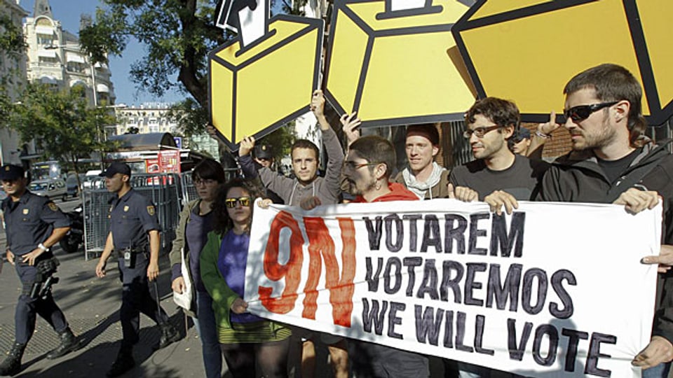 «Wir werden abstimmen», steht auf dem Plakat junger Katalanen, am 30. September in Madrid.