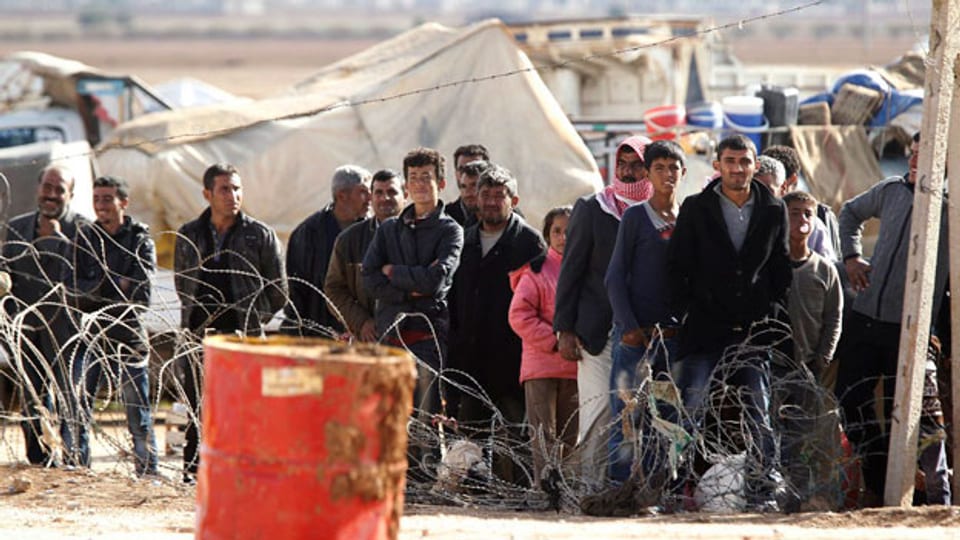 Flüchtlinge in einem Flüchtlingscamp bei Kobane.