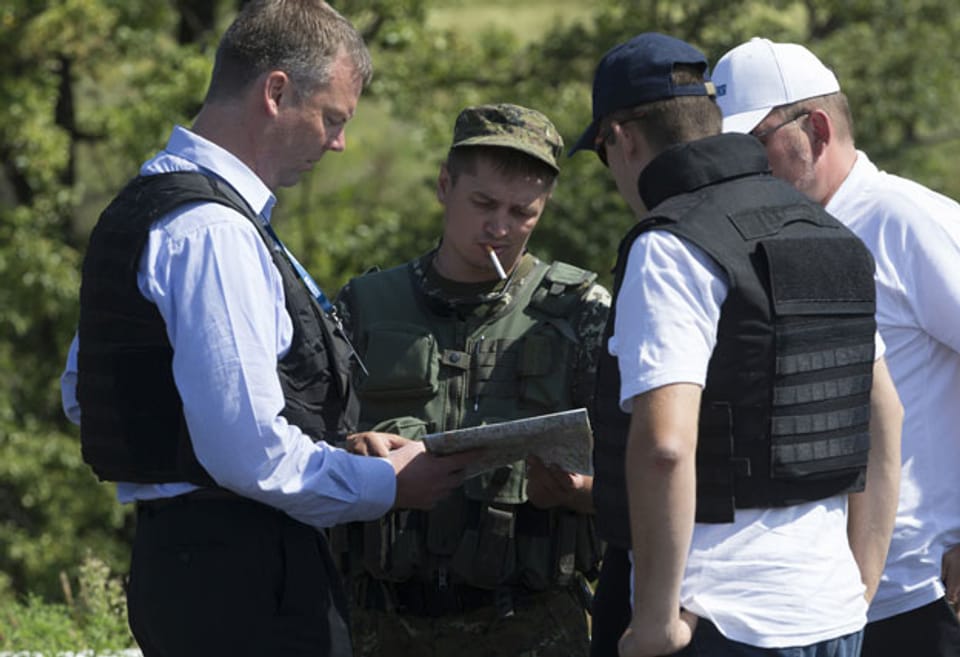 Alexander Hug (links) im Einsatz in der Ukraine
