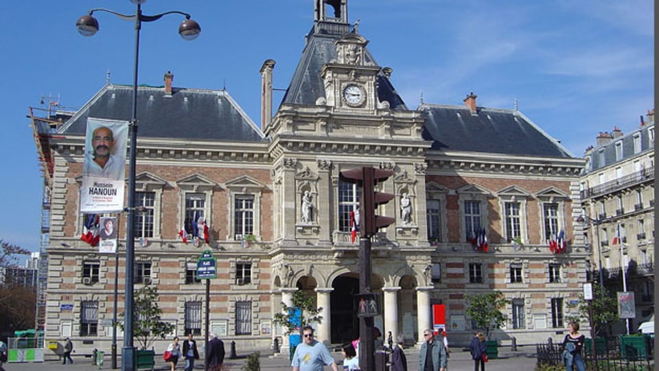 Im 19. Arrondissement bekommt die demonstrierte Einigkeit immer mehr Risse. Bild: Rathaus i m Quartier.