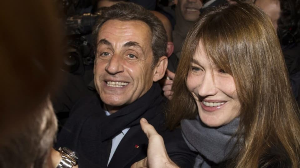 Nicolas Sarkozy mit seiner Frau Carla Bruni-Sarkozi nach der Wahl zum Präsidenten der UMP.