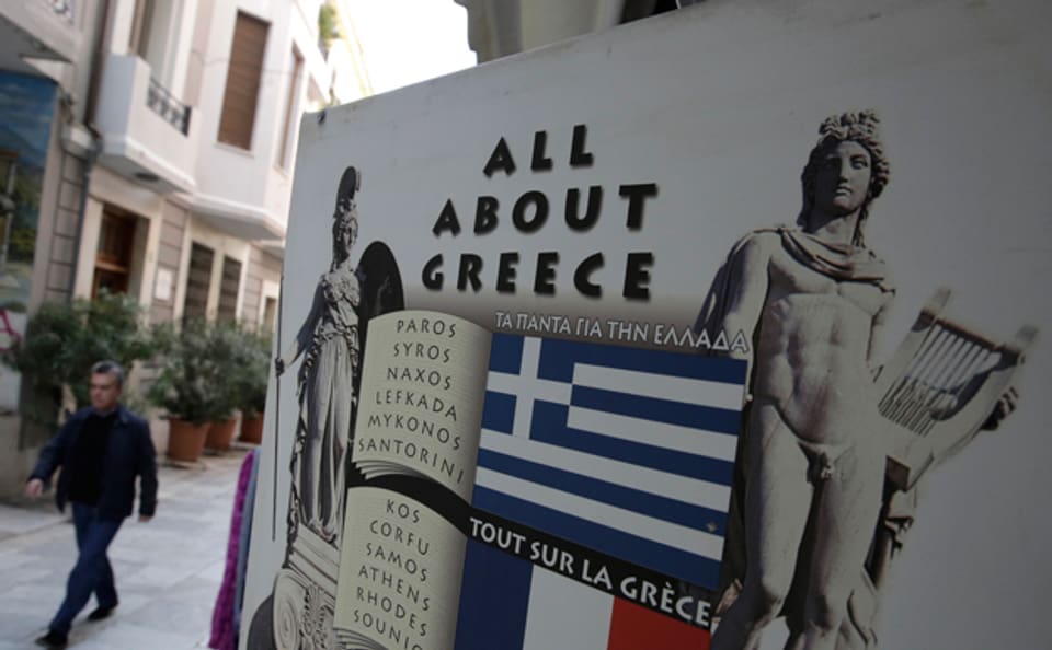 Plakat vor einem Touristenshop in Athen