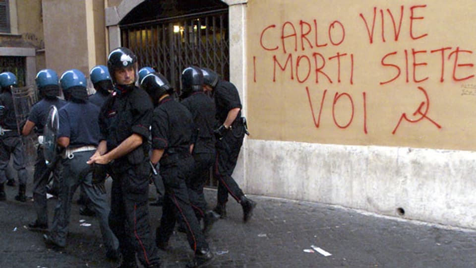 Am G8-Gipfel in Genua im 2001 sind Demonstranten von Polizisten schwer verprügelt worden.