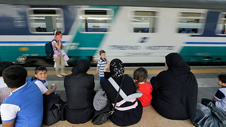 Viele Flüchtlinge aus Syrien bleiben auf ihrem Weg Richtung Norden im Bahnhof von Mailand stecken.