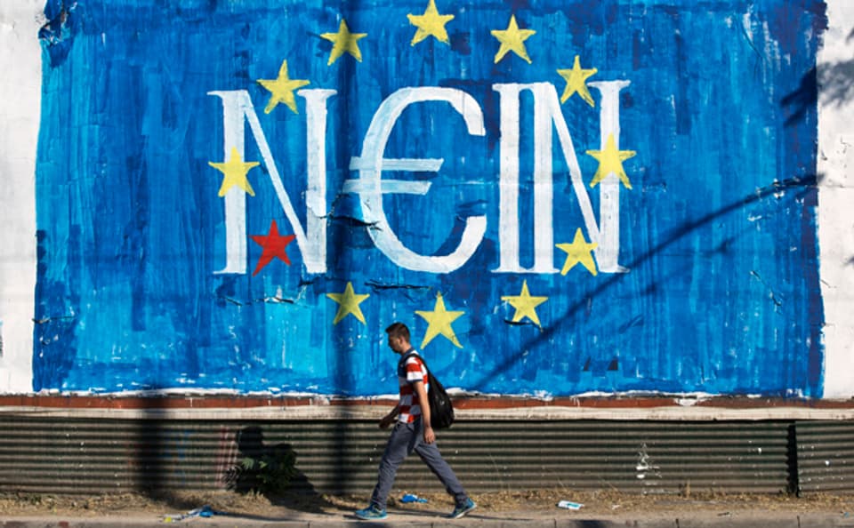 Ein Graffiti mit einem Wortspiel an einer Hauswand in Athen: Ne-in heisst auf griechisch «Ja, drin»