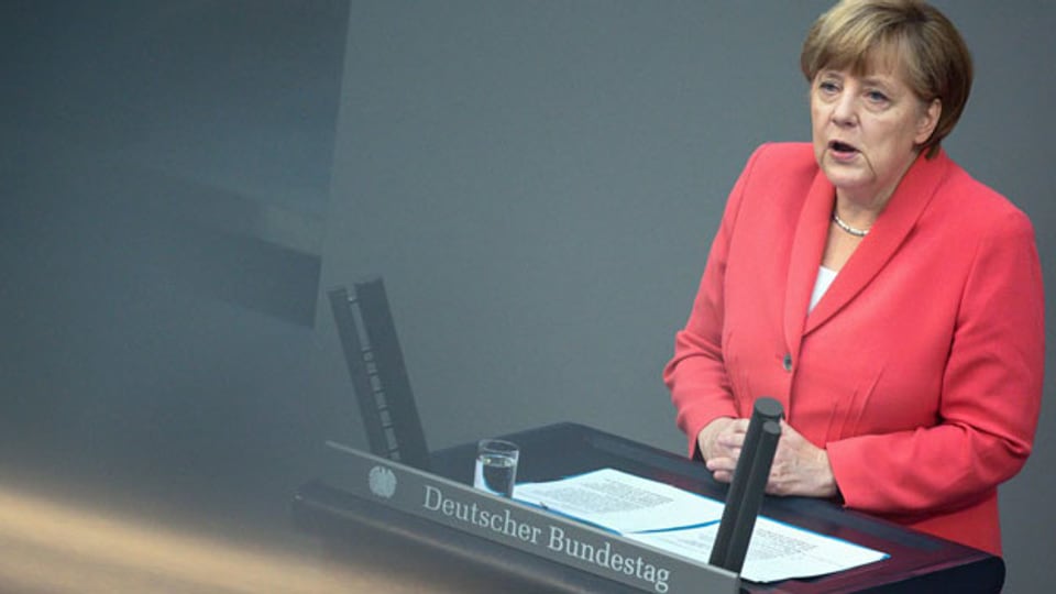 Angela Merkel erkennt die Gefahren der griechischen Krise und betont, dass sie nicht deutsche Interessen verteidige, sondern europäische.