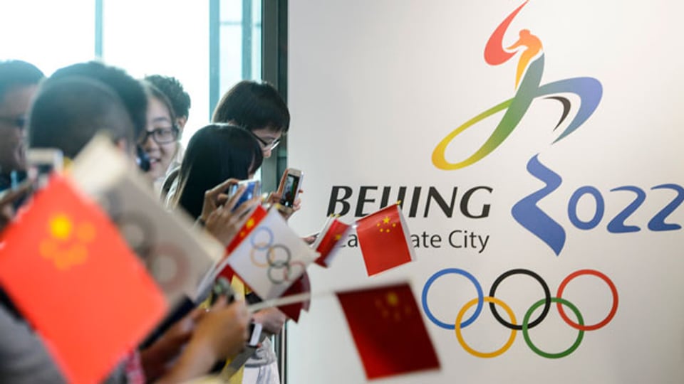 Unterstützer der Olympischen Winterspiele 2022 in Peking während der Kandidatur im Olympischen Museum in Lausanne.