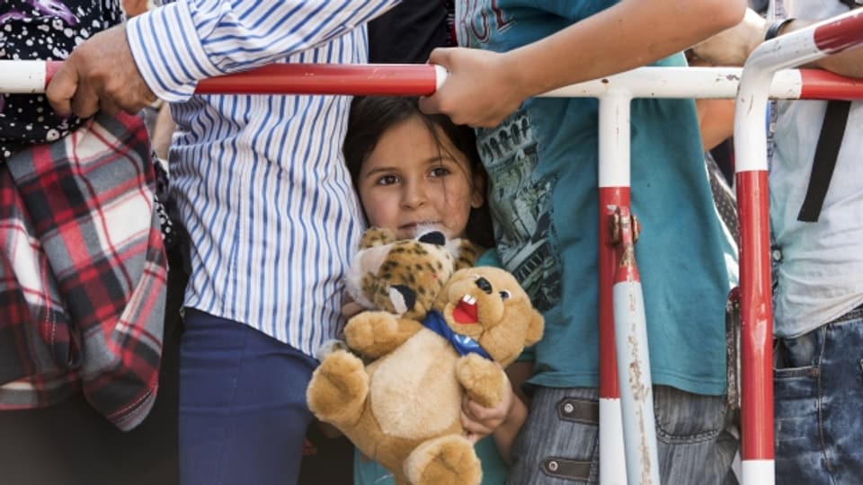 Flüchtlingskind an der Registrierungsstelle in München am Dienstag.