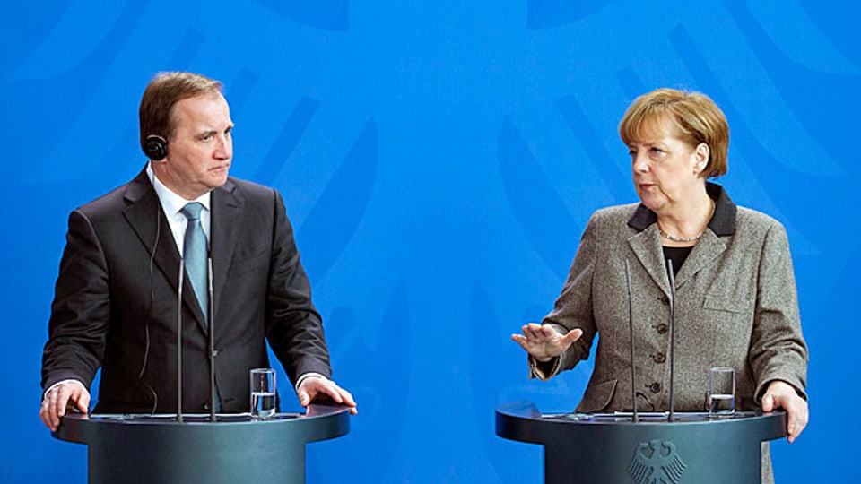 Der schwedische Premier und die deutsche Bundeskanzlerin - kann Deutschland von Schwedens Erfahrungen mit der Integration von Flüchtlingen profitieren?