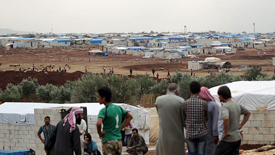 Jede Verschärfung des Konflikts verstärkt das Leiden der syrischen Bevölkerung enorm. Bild: Flüchtlingslager Atma an der syrisch-türkischen Grenze.