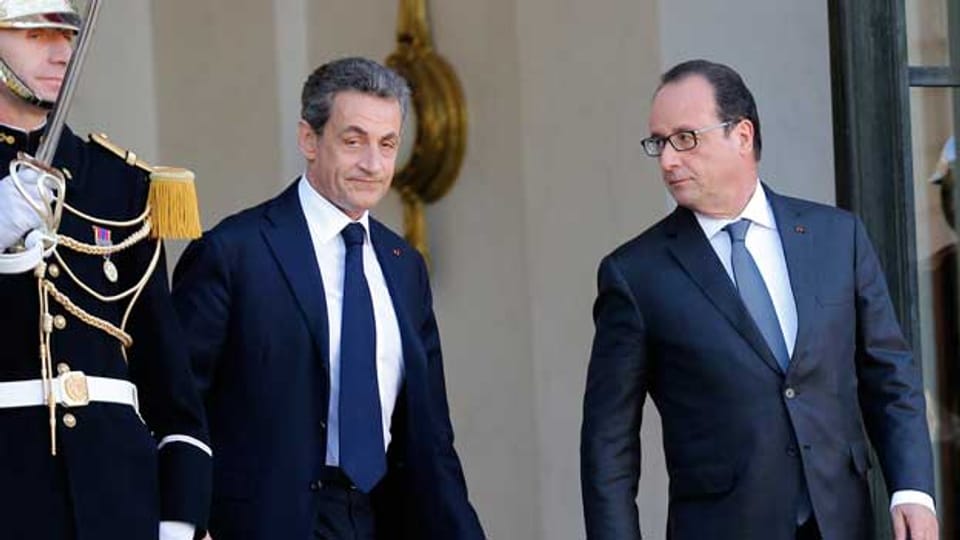 Präsident Hollande verabschiedet Nicolas Sarkozy, den Chef der französischen Oppositionspartei UMP.