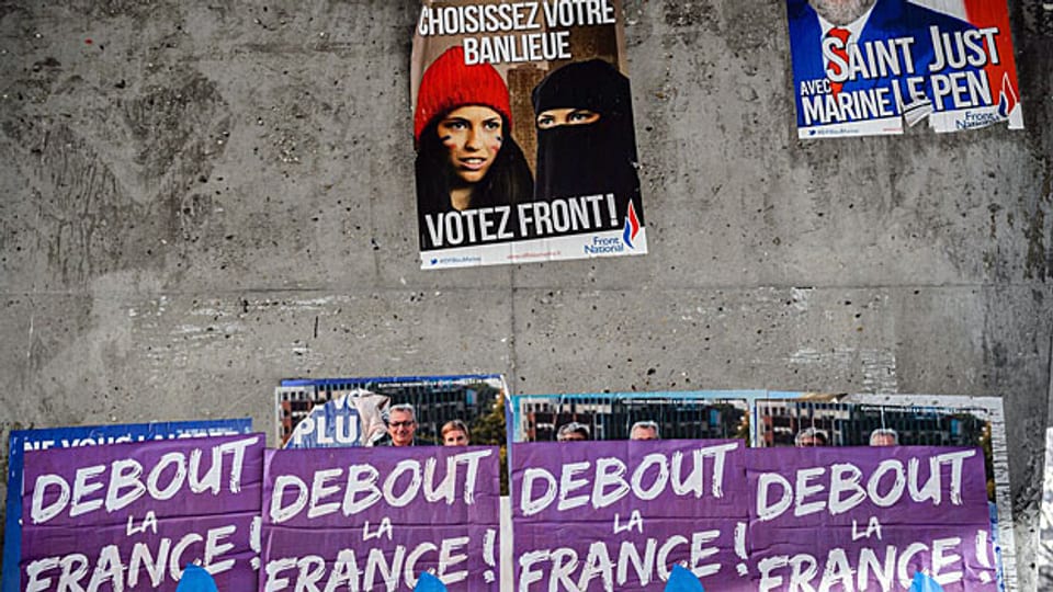 Die Regionalwahlen bewirken einen nachhaltigen Rutsch in Richtung rechts. Auf dem Tummelplatz des Front National gibt es aber keinen Platz für politische Alternativen. Bild: Wahlpropaganda des FN in Paris.