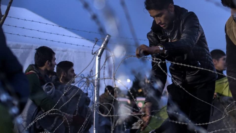 Afghanischer Flüchtling an der Grenze zwischen Griechenland und Mazedonien am 22. Februar 2016.