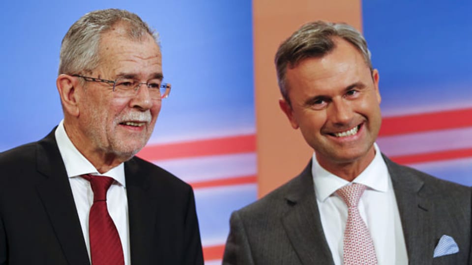 Die Kandidaten Alexander van der Bellen (links) und Norbert Hofer.