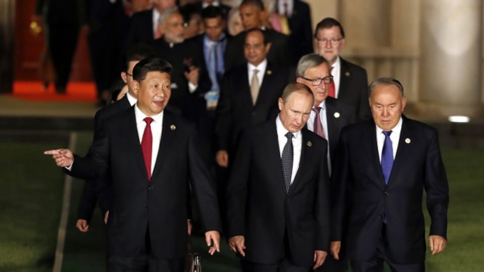 Der chinesische Präsident Xi Jinping führt die Staatschefs zur nächsten Sitzung am G20-Gipfel..