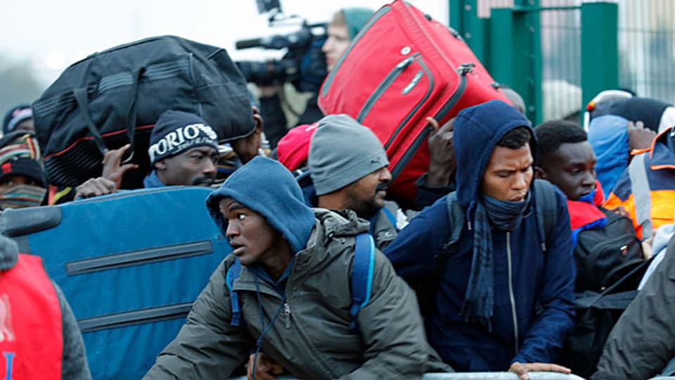 «Ich bin glücklich, dass ich hier weg kann», sagt ein Flüchtling gegenüber der Nachrichtenagentur AFP.
