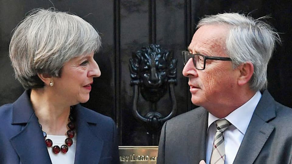 Die britische Premierministerin Theresa May und der EU-Kommissionspräsident Jean-Claude Juncker.