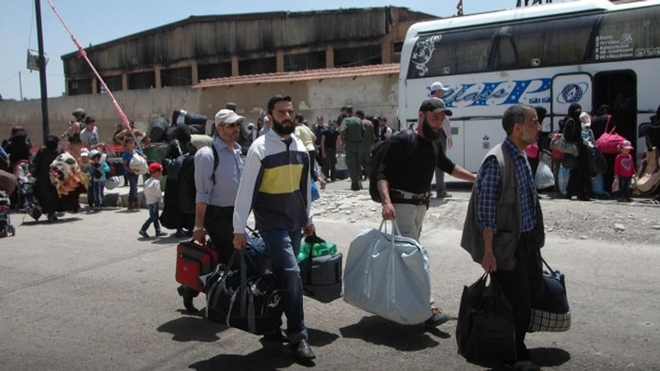 Menschen aus Homs evakuiert.