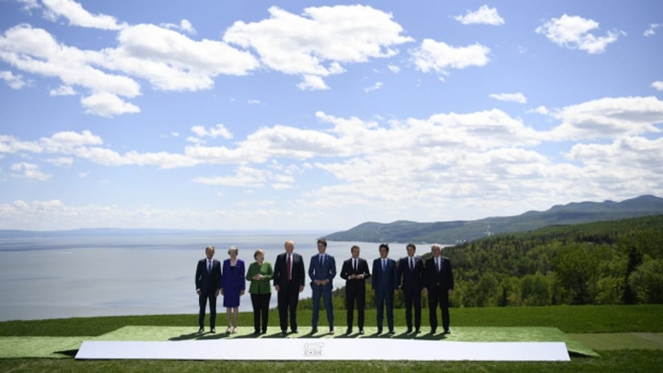Die Idylle trügt: am G7-Gipfel in Kanada ist in zentralen Themen keine Einigung in Sicht.