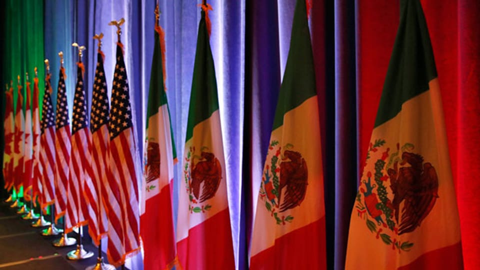 Die Flaggen von Kanada, USA und Mexiko.