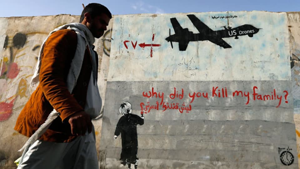 Wand-Graffiti in Sanaa, das US-Drohnen im Jemen anklagt.