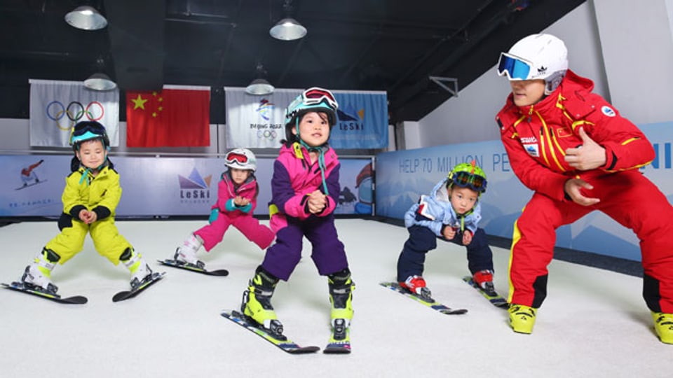 Kinder in der Skischule. Von Chinas Gesamtbevölkerung fährt nur ein Prozent Ski.