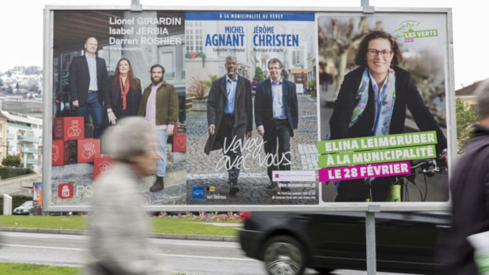 SP-Exekutivmitglied Lionel Girardin ist suspendiert; Michel Agnant und Jérôme Christen von der Mitte-Bewegung «Vevey Libre» beurlaubt. Bild. Wahlplakat vom Februar 2016.