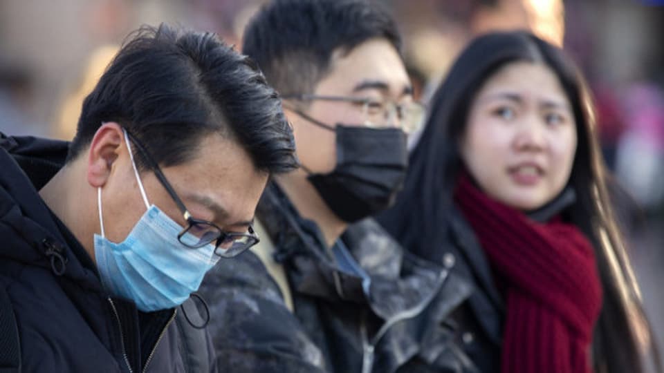 In China versuchen die Menschen sich mit Gesichtsmasken vor dem Corona-Virus zu schützen.
