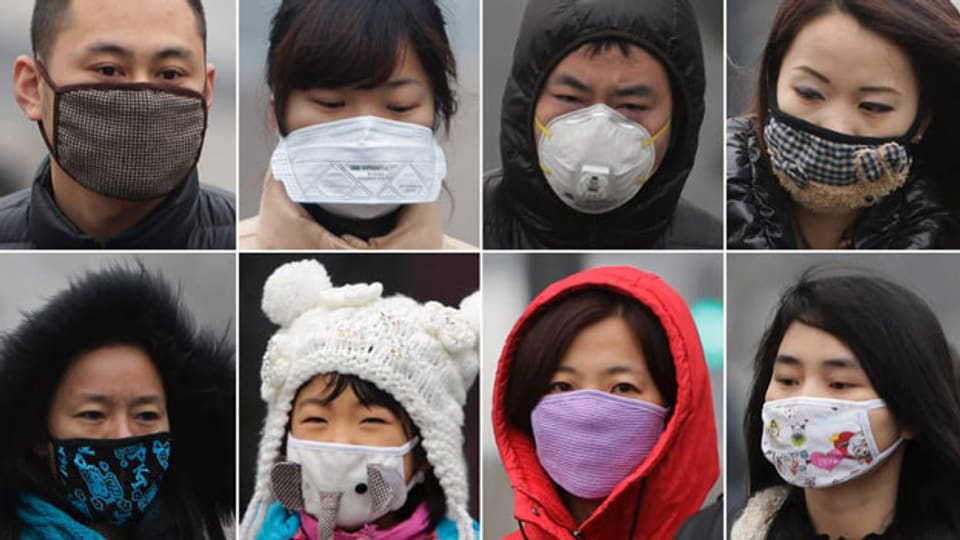 In China schützen sich die Menschen mit Gesichtsmasken.