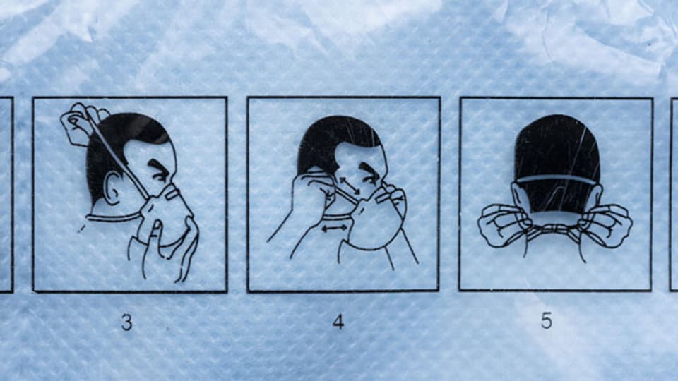 Anleitung für das korrekte Aufsetzen einer FFP2 Atemschutzmaske.